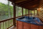 Screened-in Hot tub area overlooking the Coosawattee River 